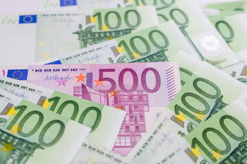 500 euros and a lot of 100 euros banknotes.
