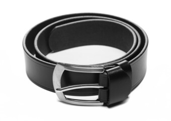 Black new leather belt, strap with metal buckle isolated on white background
