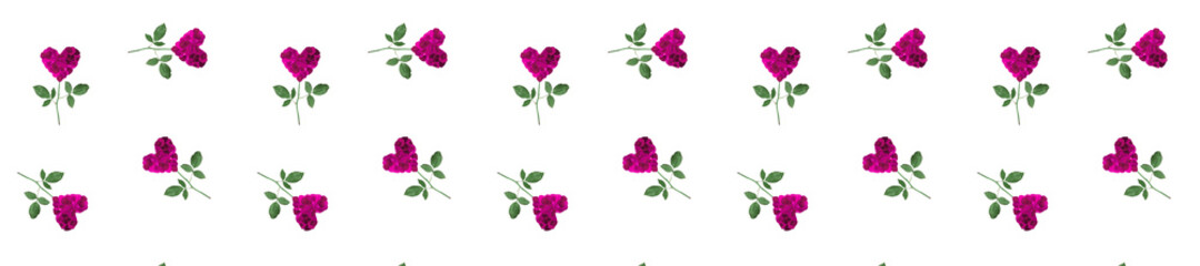 Panorama flowers in the shape of hearts made of rose petals.