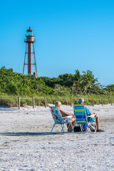Sanibel Island Lighthouse and Couple on Beach