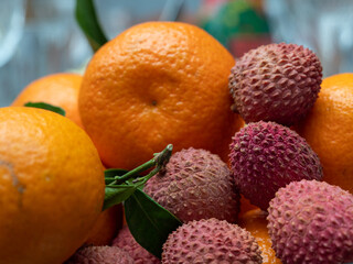 Lychee and tangerine close-up.