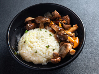 rice with mushroom second course risotto mushrooms healthy meal food snack on the table copy space food background rustic