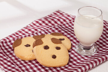 bear shaped flour cookies on white background