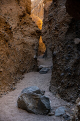 Large Boulders Dot The Path Through Slot Canyon In Death Valley