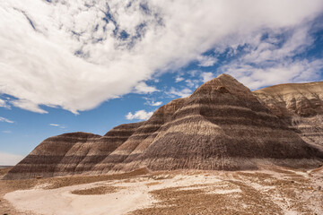 Looking Up At Tall Badlands Formations