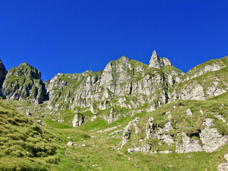 Fototapeta na wymiar mountain landscape with sky, Malaiesti Valley, Bucegi Mountains, Romania 