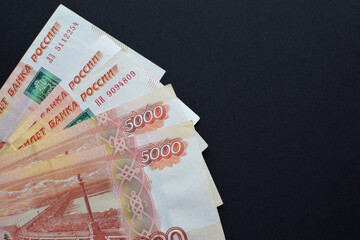 Money of Russia. Banknotes and coins. Close-up of Russian rubles of various denominations. Finance...