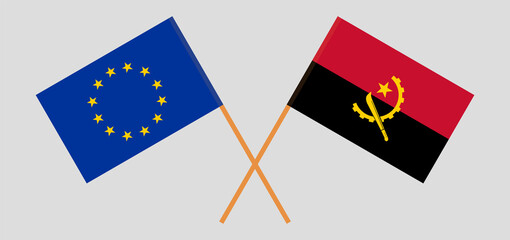 Crossed flags of the European Union and Angola. Official colors. Correct proportion