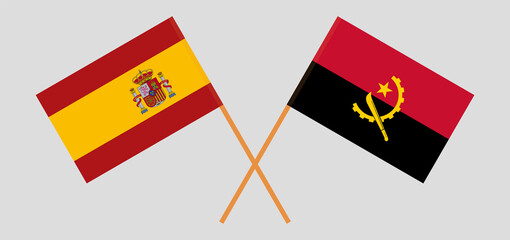 Crossed flags of Spain and Angola. Official colors. Correct proportion