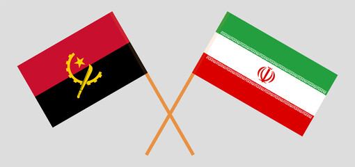 Crossed flags of Angola and Iran. Official colors. Correct proportion