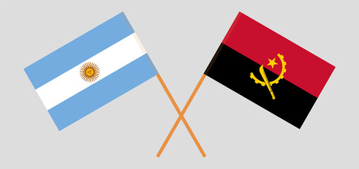 Crossed flags of Argentina and Angola. Official colors. Correct proportion