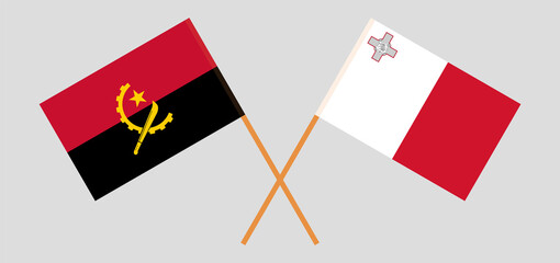 Crossed flags of Angola and Malta. Official colors. Correct proportion