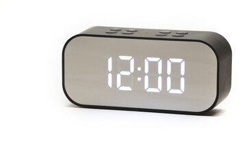 Clock with a time of 12 hours 00 minutes on a white background