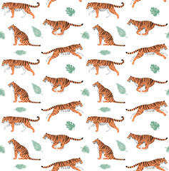 Vector seamless pattern of hand drawn flat colored tigers and palm leaves isolated on white background