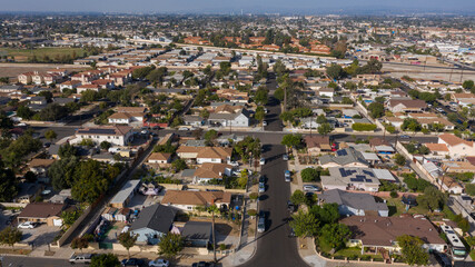 Naklejka premium Daytime aerial view of the dense urban core of downtown Stanton, California, USA.