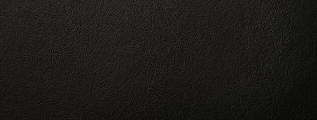 黒いレザー調の質感のある紙の背景テクスチャー