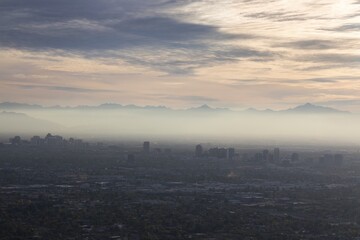 Aerial Landscape View of Smog Pollution Layer Over Metropolitan City of Phoenix Valley from summit of Piestewa Peak in Phoenix Arizona Mountain Preserve