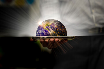 Businessman or investor manage the world of business. using a glowing globe in global investment finance management concept