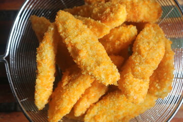 Freshly ripe fried bananas with a brown color made with bananas dipped in a mixture of liquid flour and breadcrumbs
