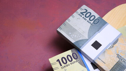 Indonesian Rupiah the official currency of Indonesia. Business and finance concept, Uang 1000 Rupiah, Uang 2000 Rupiah, Bank Indonesia
