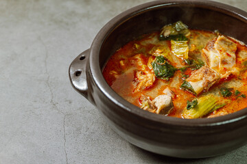 Ugeojigalbitang, Korean Cabbage and Short Rib Soup : Napa cabbage leaves slowly simmered in a beef rib stock and seasoned with doenjang (soybean paste). Ugeoji refers to the green outer layer of Napa 