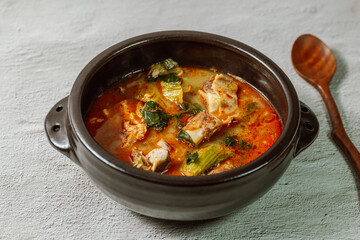 Ugeojigalbitang, Korean Cabbage and Short Rib Soup : Napa cabbage leaves slowly simmered in a beef rib stock and seasoned with doenjang (soybean paste). Ugeoji refers to the green outer layer of Napa 
