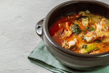 Ugeojigalbitang, Korean Cabbage and Short Rib Soup : Napa cabbage leaves slowly simmered in a beef rib stock and seasoned with doenjang (soybean paste). Ugeoji refers to the green outer layer of Napa 