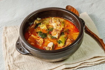 Ugeojigalbitang, Korean Cabbage and Short Rib Soup : Napa cabbage leaves slowly simmered in a beef rib stock and seasoned with doenjang (soybean paste). Ugeoji refers to the green outer layer of Napa 