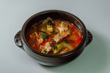 Ugeojigalbitang, Korean Cabbage and Short Rib Soup : Napa cabbage leaves slowly simmered in a beef rib stock and seasoned with doenjang (soybean paste). Ugeoji refers to the green outer layer of Napa 