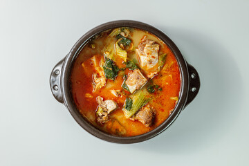Ugeojigalbitang, Korean Cabbage and Short Rib Soup : Napa cabbage leaves slowly simmered in a beef rib stock and seasoned with doenjang (soybean paste). Ugeoji refers to the green outer layer of Napa 
