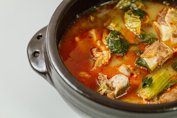 Ugeojigalbitang, Korean Cabbage and Short Rib Soup : Napa cabbage leaves slowly simmered in a beef rib stock and seasoned with doenjang (soybean paste). Ugeoji refers to the green outer layer of Napa 