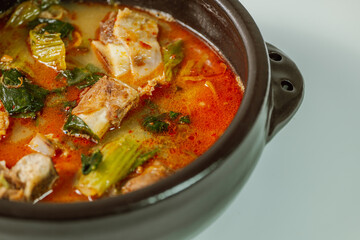 Ugeojigalbitang, Korean Cabbage and Short Rib Soup : Napa cabbage leaves slowly simmered in a beef rib stock and seasoned with doenjang (soybean paste). Ugeoji refers to the green outer layer of Napa 