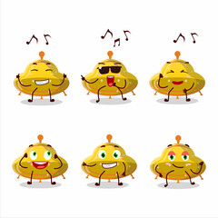 An image of UFO yellow gummy candy dancer cartoon character enjoying the music