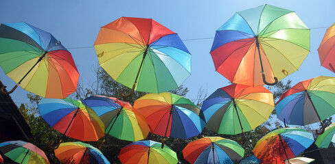 Fototapeta na wymiar Multicolored umbrelas. Street decoration.Exterior of downtown Marmaris, Turkey.