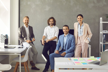People in a meeting in a business center. Portrait of group of successful confident and cheerful...