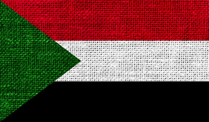 Sudan flag on knitted fabric.3D image