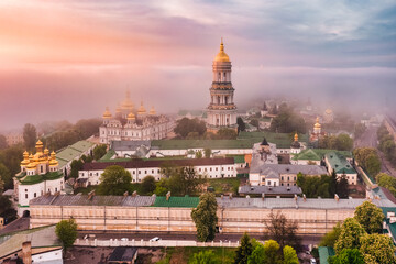 Aerial view of the Kiev-Pechersk Lavra at dawn, covered with thick fog. Kiev, Ukraine