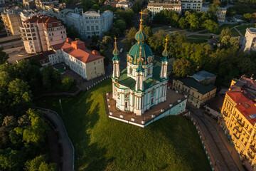 Aerial view of St. Andrew's Church and St. Andrew's Street is one of the most important sights of the city of Kiev. City landscape of the Podolsk region. Tourism, recreation, vacation.