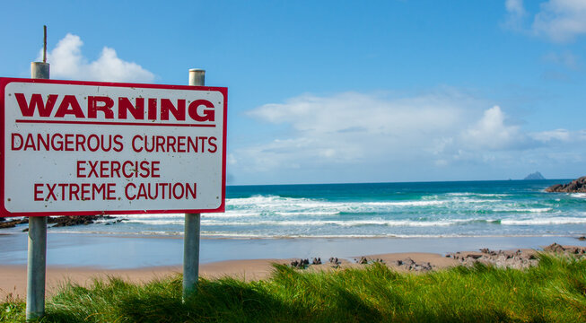 Warning Sign - Dangerous Currents - fast-moving channels of water that are very difficult to swim against.