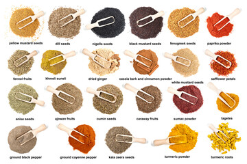 set of wooden scoopes on piles of ground spices