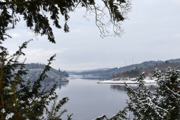 Photo of the snow-covered river bank from the castle walls