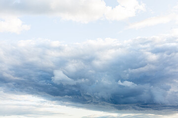 Obraz premium Stormy sky, clouds with glimpses of light