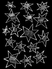 There are various white stars painted on a black background