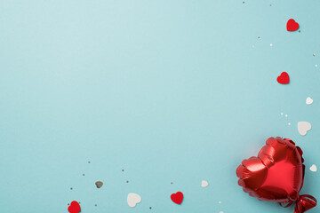 Top view photo of valentine's day decorations heart shaped balloon red and white hearts confetti and sequins on isolated pastel blue background with copyspace - Powered by Adobe