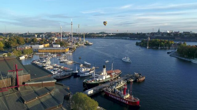 Panorama of Stockholm city on a sunny day - Grona Lund amusement park, Djurgarden and Stockholms inlopp