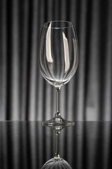 Empty wine glass on dark gray background