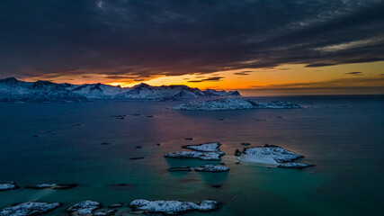 Small snowy Islands at the Norwegian Coast  with the 