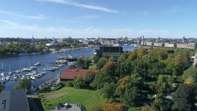 Panorama of Stockholm city on a sunny day - Grona Lund amusement park, Djurgarden and Stockholms inlopp