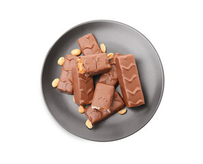 Plate of chocolate bars with caramel, nuts and nougat isolated on white, top view