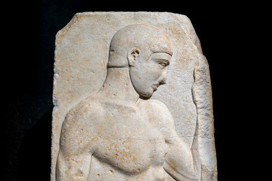 Funerary stele relief sculpture of a nude greek athlete or Doryphoros from Nisyros. Istanbul Archaeology Museum, Turkey.